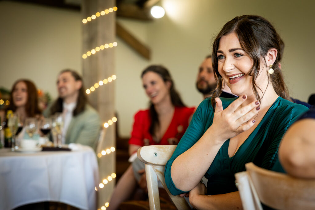 Laughter during wedding speeches.