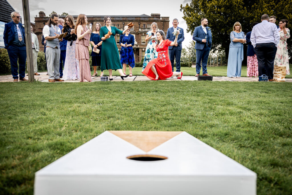 Wedding guests posing during games at Bredenbury Court.