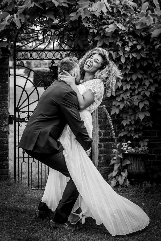 Black and white bride and groom portrait.