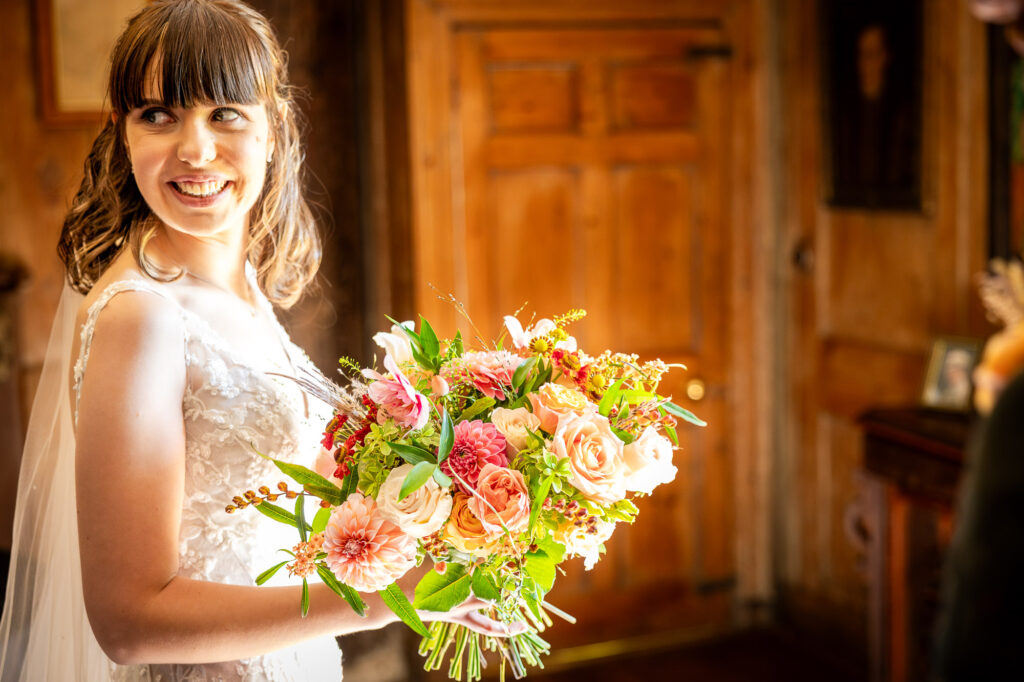 A bride holding her bouquet by White and Winsome.