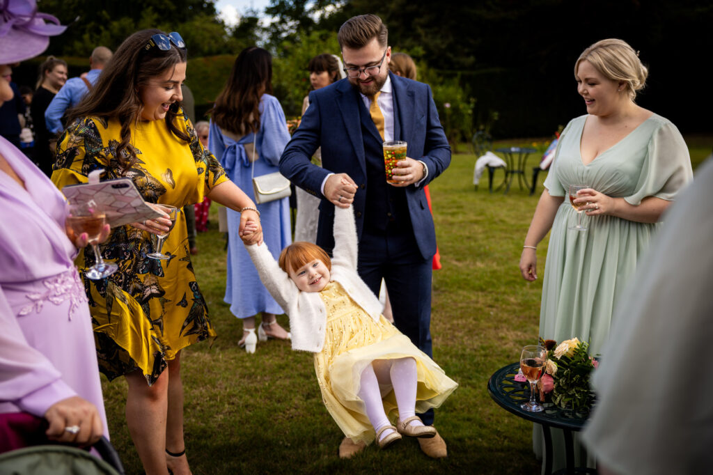 A girl playing at a wedding reception.