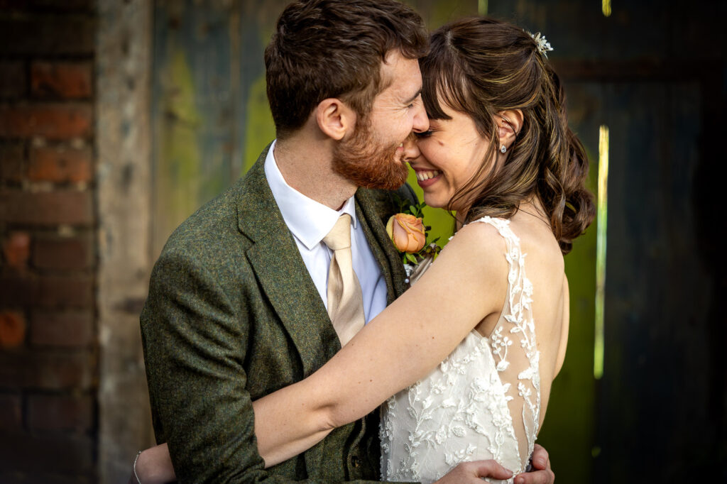 Newlyweds share a loving moment.