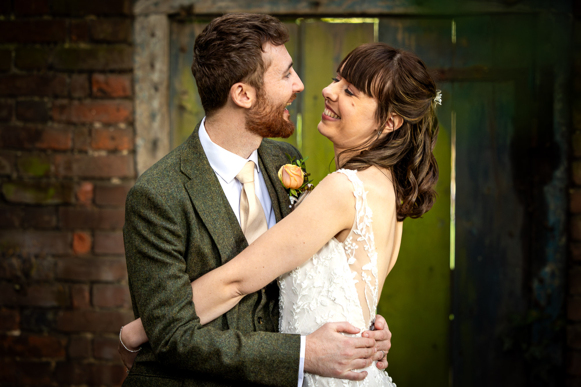 A portrait of a happy newly-married couple.