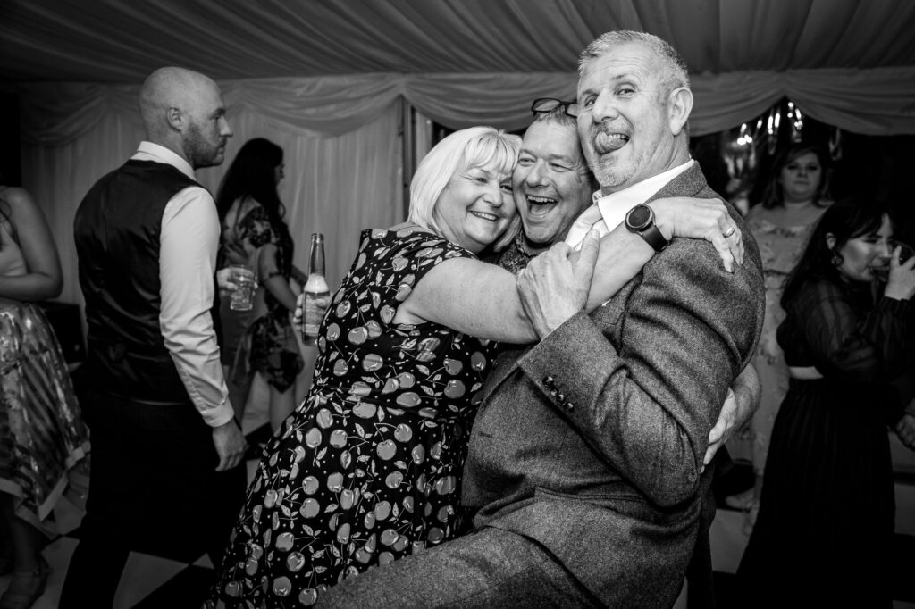 Fun on the dance floor at wedding reception.