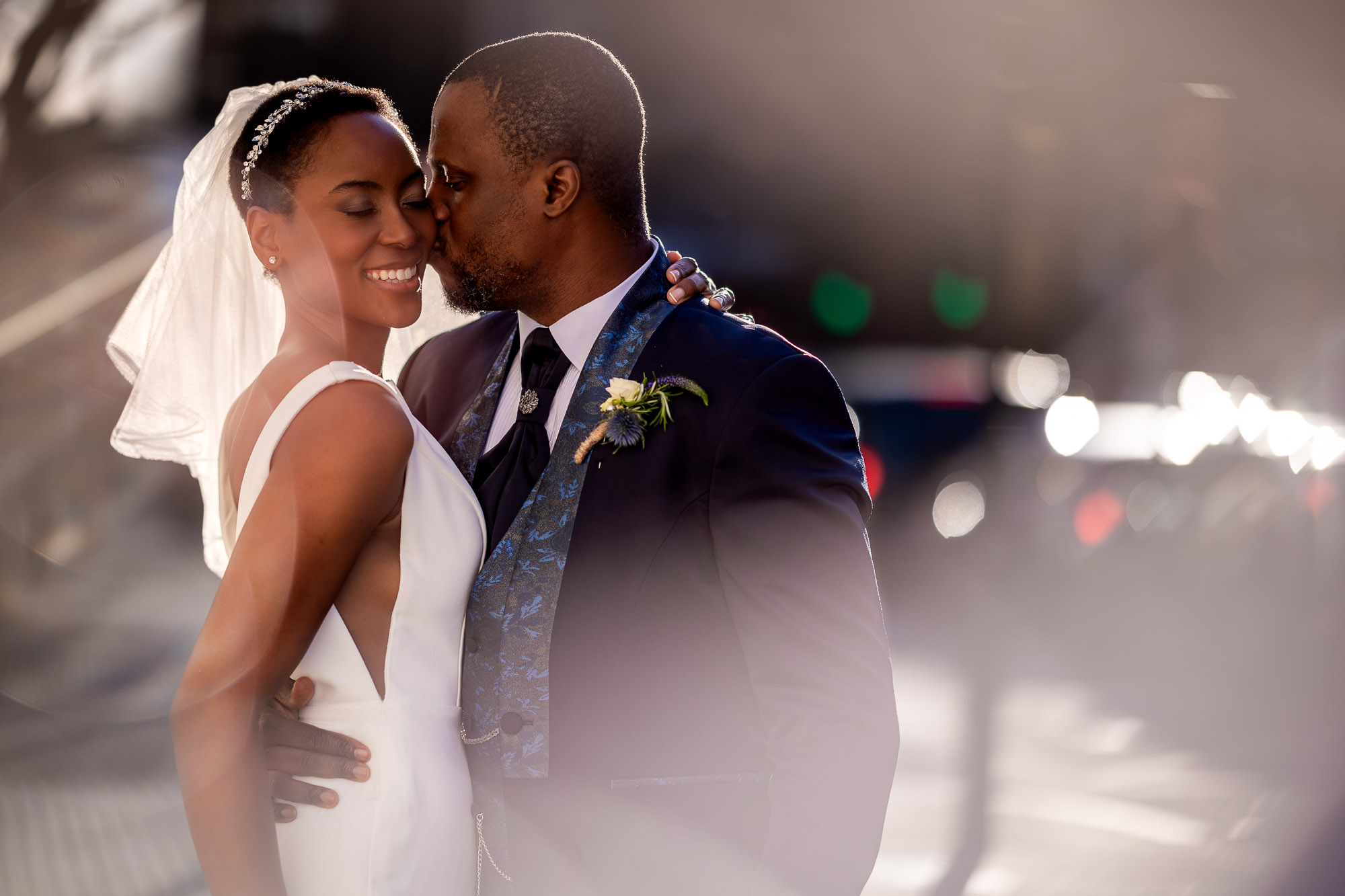 Laughing bride and groom.