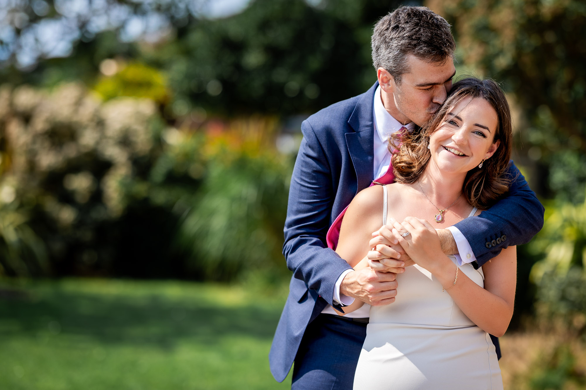 Laughing bride and groom.